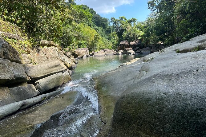 El Yunque & Beach Tour: Waterslide, Waterfall, Food, & Photos - Luquillo Beach: the 1-Hour Reset on Puerto Rico’s Coast