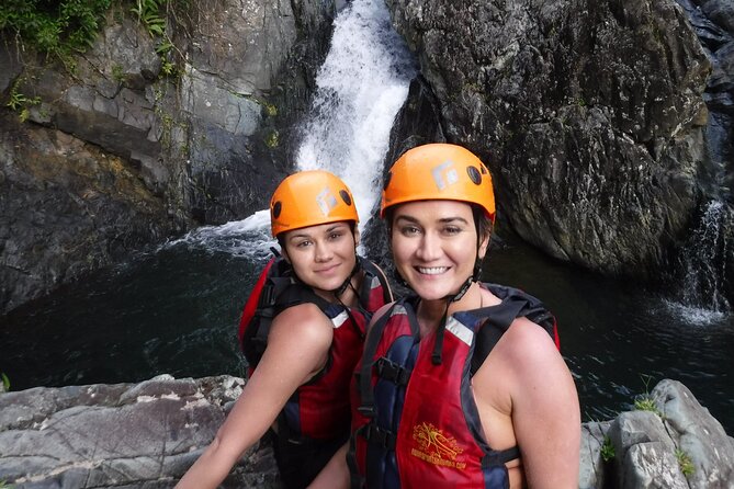 El Yunque Rainforest Tour: Natural Waterslides Adventure - Safety first, then fun: helmets, life jackets, and guide support