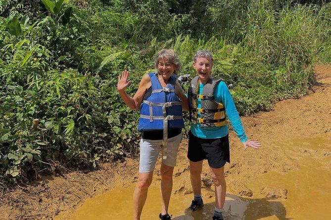 El Yunque Small Group Tour with Luquillo Lunch Stop and Transport - Waterfall time at Las Tinajas: swimming, slides, jumps, and safety gear