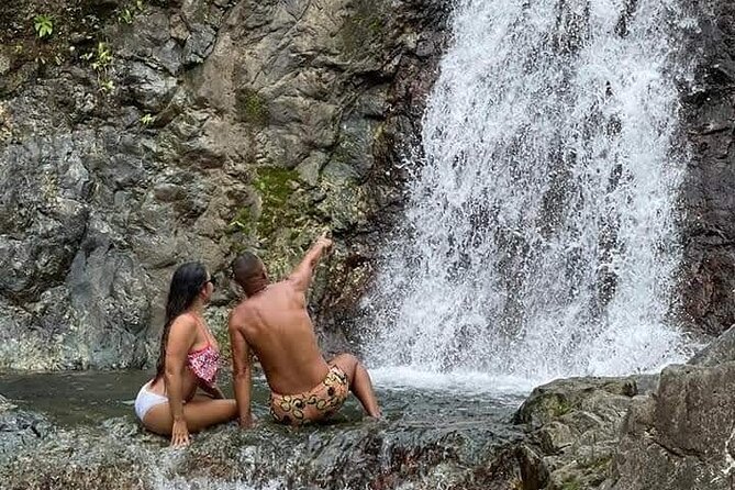 El Yunque Tour with Luquillo Lunch Stop and Transport: 6 ppl Max - The river payoff at Rio La Tinajas: cooling off, natural pools, and optional thrills