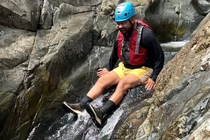 From San Juan: El Yunque Rainforest Hiking Adventure - Swimming Stops, Rope Swing Moments, and a 20-Foot Natural Waterslide