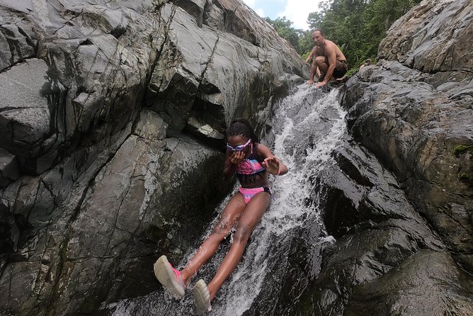 Half-Day Yunque Rainforest Waterslide & rope swing Guided Tour - Stop 2: Natural Rock Waterslide and Cliff Jump (Where the Workout Gets Real)