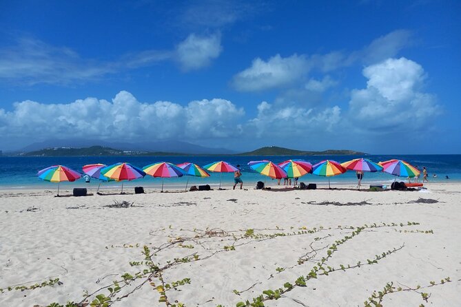 Icacos Beach Day Package with Water Taxi Transport from Fajardo - Your island setup: umbrellas, cooler drinks, and snorkel kit