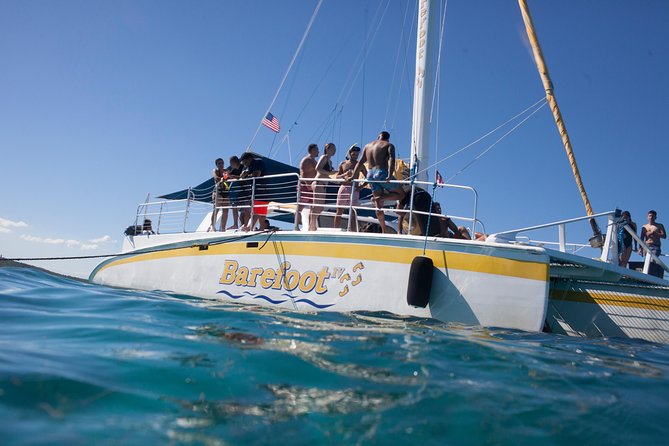Icacos Deserted Island Catamaran, Snorkel, and Picnic Cruise - The sail out: music, drinks, and a quick island approach