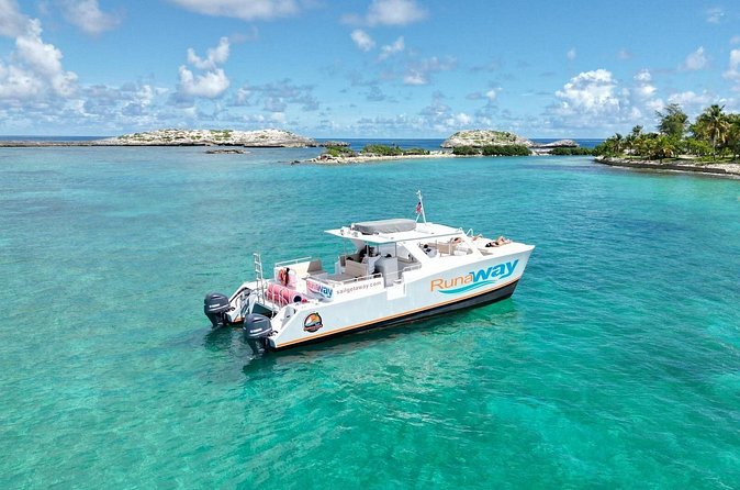 Icacos Double Dip Power Catamaran Snorkel & Beach Tour - Icacos beach time: your chance to recover and actually enjoy the island