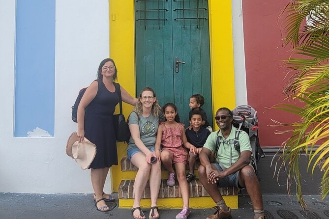 Intensive Old San Juan Opulent Coffee/Rum/Tastings Walking Tour - Calle de la Fortaleza and the umbrella street art moment