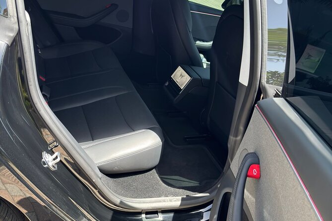 Puerto Rico Island Wide Private Transfers, Tesla 3 Luxury Sedan. - San Juan to Dorado and Beyond: Why This Transfer Feels Worth It