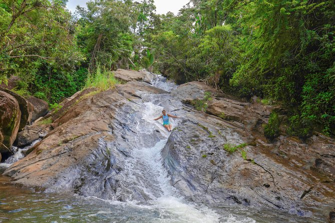 Yunque Rainforest River Rope Swing with Waterslide and Beach Tour - Key highlights at a glance